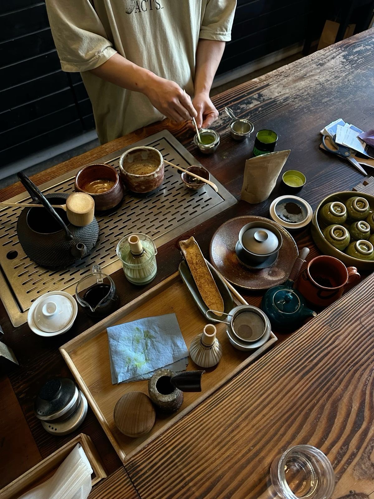 Japanese tea set with cast-iron kettle, matcha whisk and ceramic cups